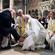 Dr Williams washes churchgoers' feet during the Maundy Thursday service at Canterbury Cathedral. Photo: PA