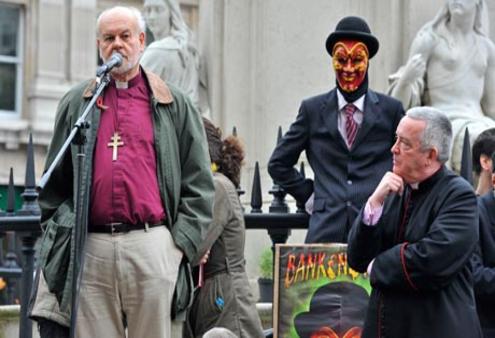 The Bishop of London, Richard Chartres, and the Dean of St Paul's, the Very Rev Graeme Knowles, address protesters. Photo: Ray Tang/Rex Features