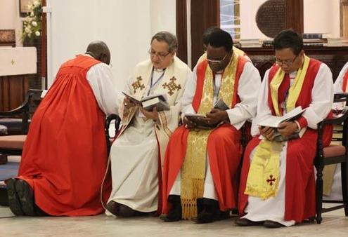 Archbishops at prayer during the Global South opening service in Singapore.