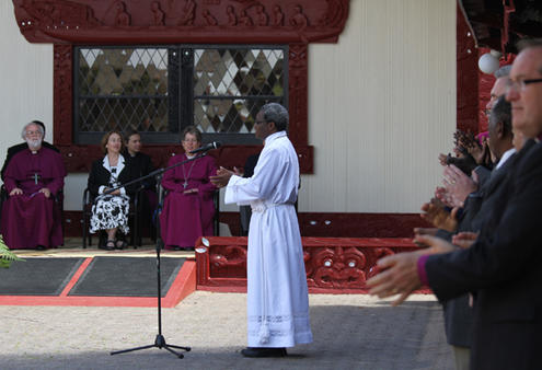 The ACC chair, Bishop James Tengatenga from Malawi, leads a waiata: "We are walking in the light of God."