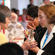 Dr Jane Williams (right), the Archbishop's wife, receives the cup of blessing from Pauline Massey.