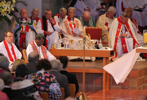 The altar cloth in Holy Trinity Cathedral stirs gently in the breeze accompanying the ACC's opening Eucharist.