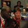 Abraham Yisa (Nigeria) and the Rev Janet Trisk (Southern Africa) follow the debate during an ACC plenary meeting in Kingston.
