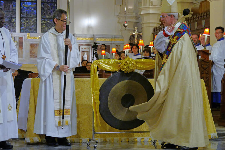 Archbishop of Canterbury Justin Welby ceremonially opens the Anglican Consultative Council with a triple gong tone.