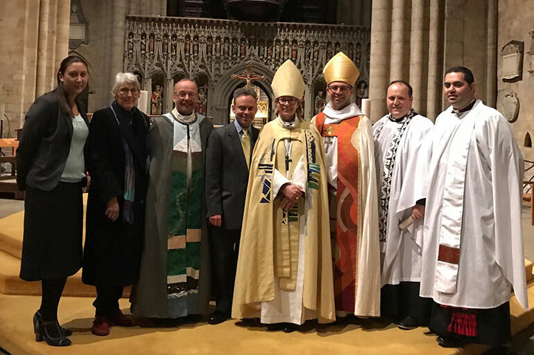 The Kiwis gather around Bishop Helen-Ann and her husband Myles. That's Ngira Simmonds and Chris Douglas-Huriwai at right.