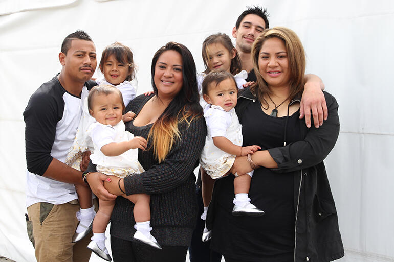 The mums and dads here are: (L-R) Isino, Khala, Marcus and Vanessa - holding Sina (front left) and Sophia; and Ariana (front right) and Summer.