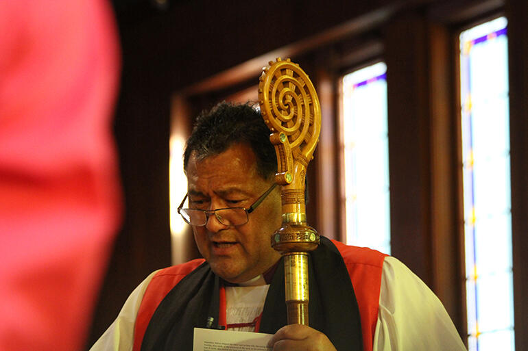 Bishop Kito behind the shoulder of one of his Anglican Maori Club choir members. Bishop Kito behind the shoulder of one of his Anglican Maori Club choir members.