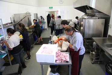 Lloyd and Rita Popata's team in the Tatai Hono kitchen.