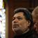 Turi Hollis leads a waiata in support of his Bishop, John Gray's contribution.