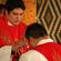 The Rev Michael Tamihere gives communion to his brother Don.