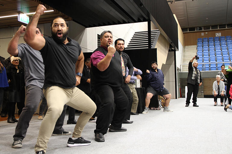 Tairawhiti performing the classic Ngati Prou haka, Ruaumoko. that's Isaac Beach in front.