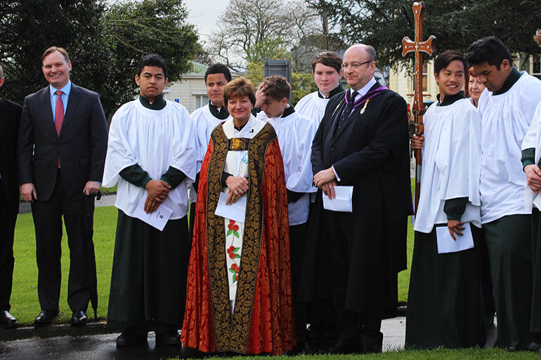 Rev Anne Mills, outside St Mark's Remuera. The Principal of Dilworth School, Mr Donald MacLean, is standing beside her. Rev Anne Mills, outside St Mark's Remuera. The Principal of Dilworth School, Mr Donald MacLean, is standing beside her.