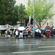 Billboard protesters kneel in prayer outside St Matthew-in-the-City.
