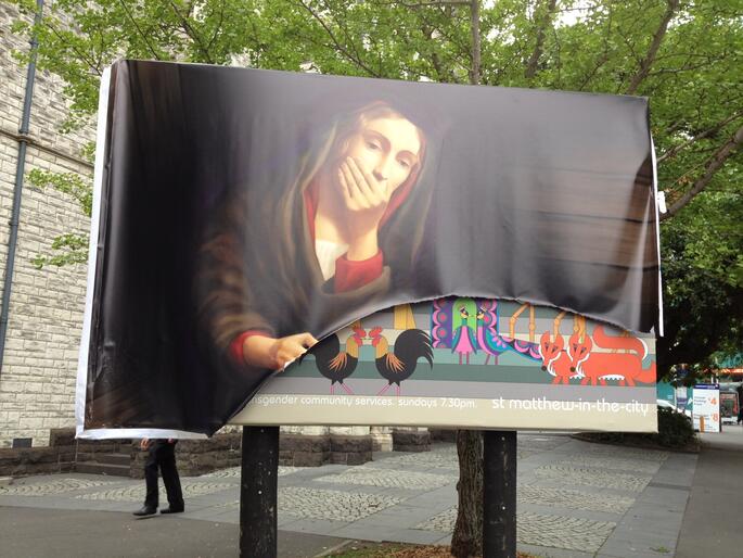 Vandalised billboard outside St Matthew-in-the-City. Vandalised billboard outside St Matthew-in-the-City.