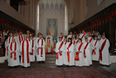 Newly ordained are presented to the congregation, who react with wild applause. Photo/Jay Berryman