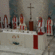 Newly ordained priests join Bishop Tom behind the altar. Photo/Jay Berryman  