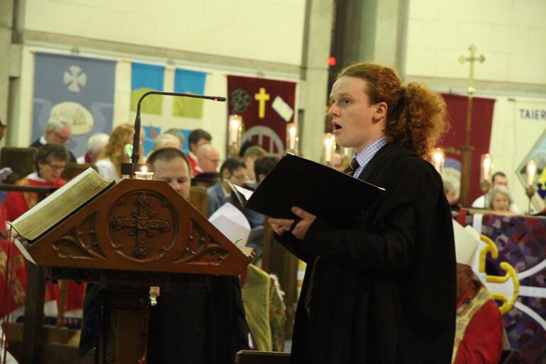 Selwyn choral scholar Patrick Manning sings the litany.