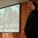 Japanese architect Shigeru Ban with a slide of his cardboard cathedral. Photo: The Press