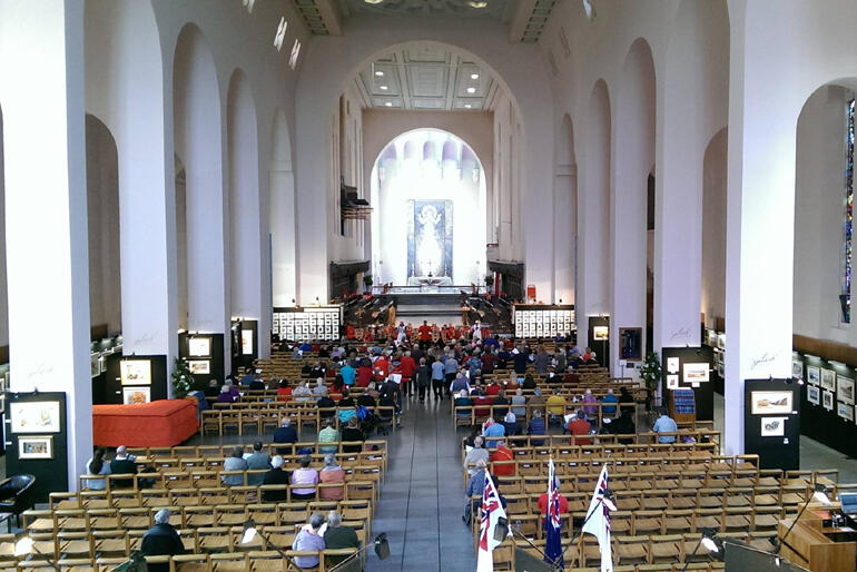 Open in time for Christmas: People gather for a (pre-quake) exhibition in the nave of Wellington's Cathedral of St Paul.