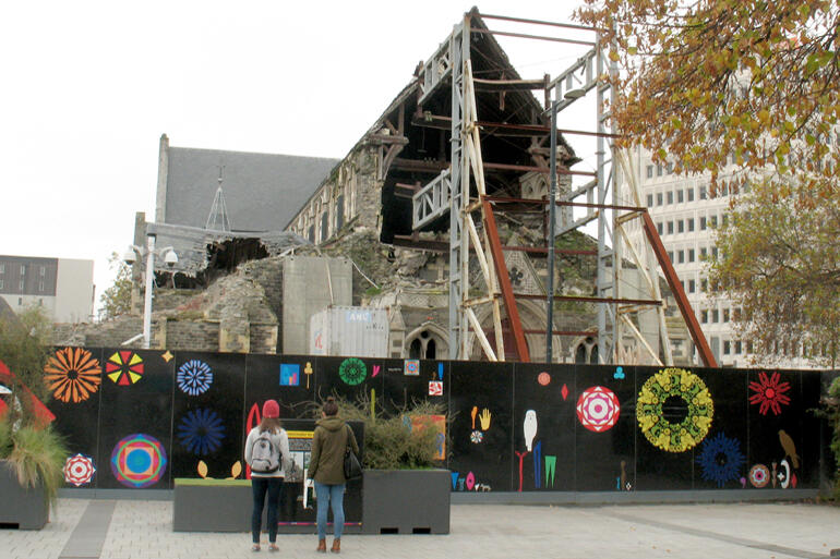 ChristChurch Cathedral stands behind hoardings in the square, April 2017. ChristChurch Cathedral stands behind hoardings in the square, April 2017.