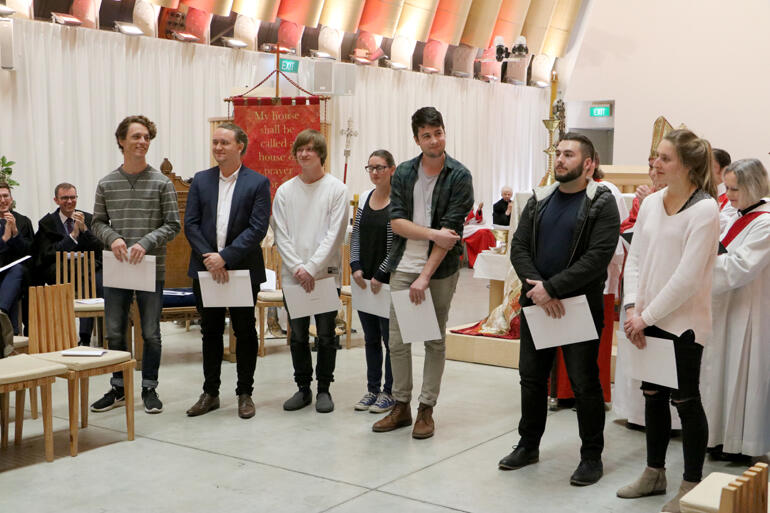 Synod applauds for its newly licenced youth leaders: Phil Parkes is second from the left, and Miriam Crowther stands on the far right.