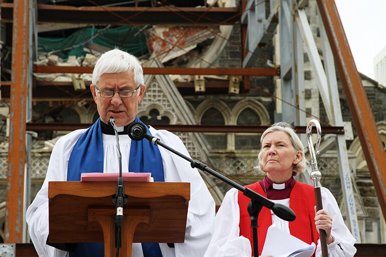November 2011: the then Dean, Peter Beck, and Bishop Victoria preside during the wrecked cathedral's deconsecration.