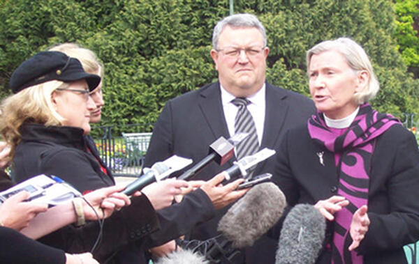 Bishop Victoria Matthews and earthquake minister Gerry Brownlee face the media. 