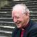 Bishop George on the steps of his cathedral in Dunedin.
