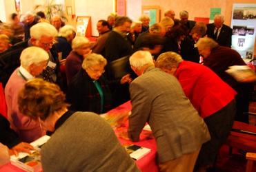 Enthusiastic buyers of the book in the cathedral after the launch. 