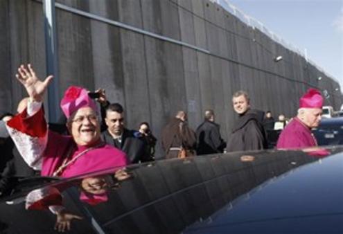 The Latin Patriarch of Jerusalem, Fouad Twal, approaches a checkpoint on his way to the Church of the Nativity in Bethlehem. Photo/Reuters  