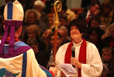 Dean Jo makes her vows before her Bishop, Ross Bay.