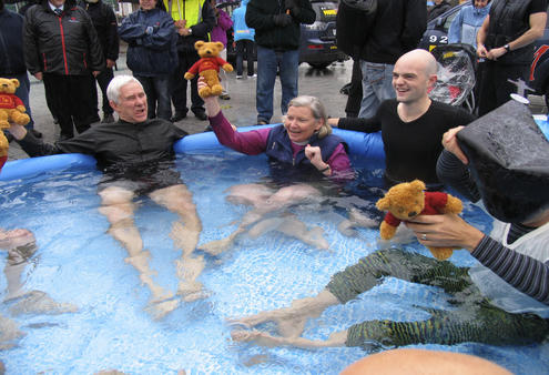 Dean Peter Beck and Bishop Victoria Matthews take the icy plunge for children with heart defects.