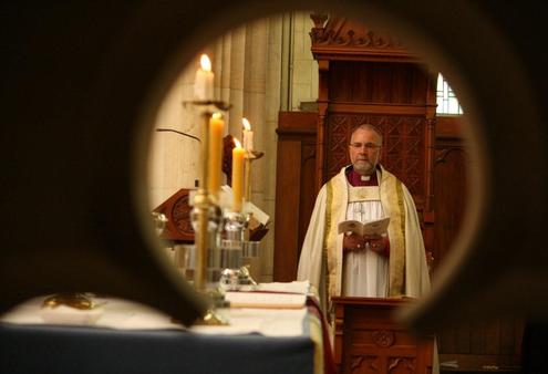 Bishop Wright watches as The Great Thanksgiving is made.