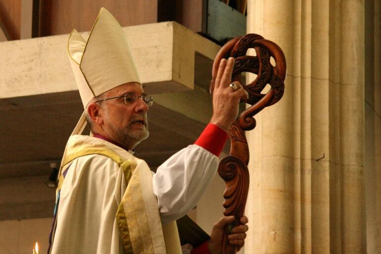 Dunedin's new Bishop bestows his blessing on the cathedral congregation.
