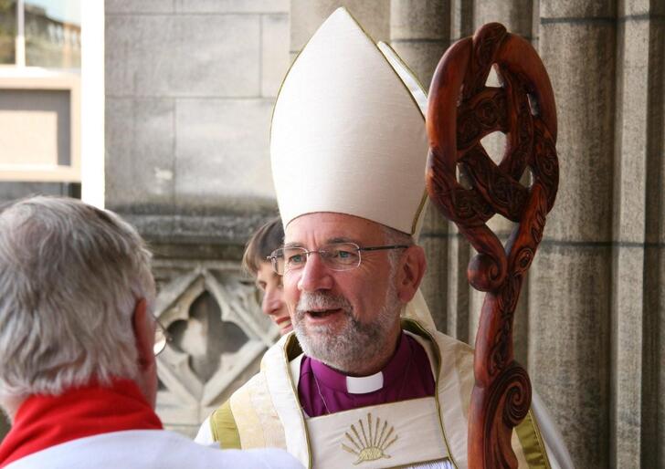 The bishop acknowledges a well-wisher.
