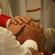 The moment of ordination: the Archbishops and Bishops lay their hands on the candidate.