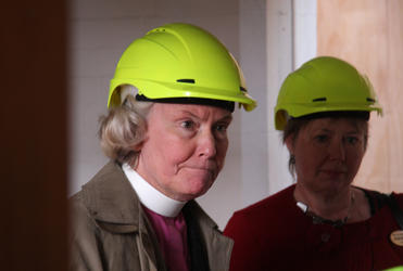 Bishop Victoria and Anglican Aged Care Director Alison Jephson listen as the structural engineer gives his verdict.