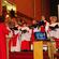 The Waiapu Cathedral Choristers sing at the signing of the organ contract.