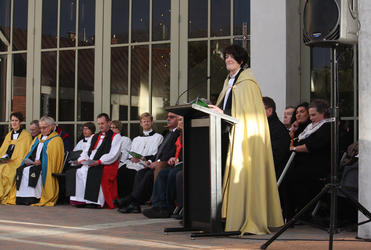 Dean Jo Kelly-Moore welcomes folk to the Mountain Fountain dedication.