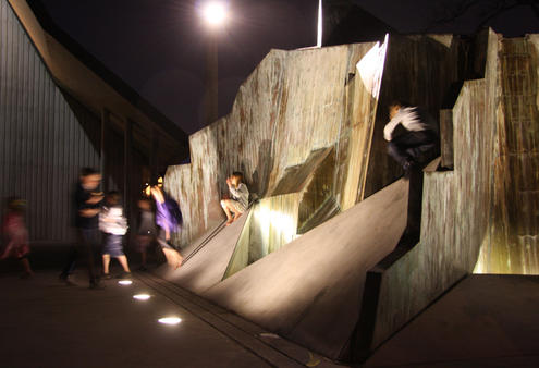 The kids check out the contours of the 'new' sculpture. 