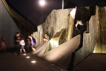 The kids check out the contours of the 'new' sculpture. 