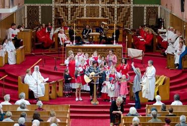 Waiapu Youth Intern Saachi Kepa leads some young choristers in singing her tune: "We have been here 150 years."
