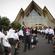 Bishop John and Marion leave Holy Trinity Cathedral to a stirring haka.