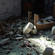 Rubble and upended prayer kneelers near the organ loft at Holy Trinity Avonside.