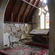 St Cuthbert's, Governors Bay - falling masonry has toppled the altar, and the stained glass window is in jeopardy.