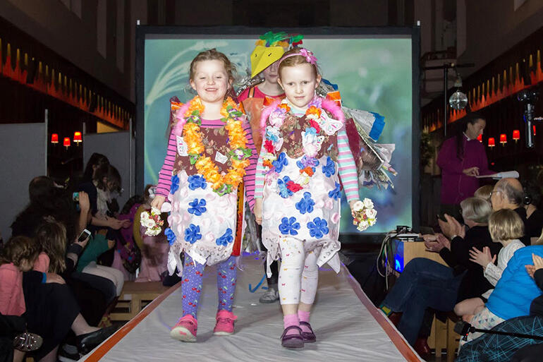 Friends Luisa and Tabitha (5) from the Parish of Northland-Wilton lead their group for their final catwalk strut.
