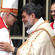 Archdeacon Turi Hollis greets Bishop Jim - and that's their campus colleague Fr George Al-Kopti waiting in the background.
