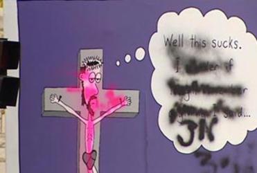 The defaced billboard outside St Matthew in the City.