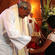 Hannah Crosse from Weber presents Waiapu's Bishop Bear to Archbishop Brown Turei.