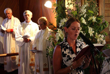 Sarah Riley-Curtis of Dannevirke reads the gospel (Mark 1: 21 - 39) for Waiapu's 150th anniversary service at Pukehou.